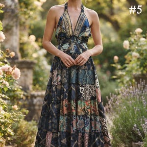 May include: A floor-length halter dress featuring a deep V-neckline and a smocked waist. The garment is decorated with a multi-colored patchwork pattern in shades of blue, black, gold, and red. The text #5 is visible in the upper right corner.