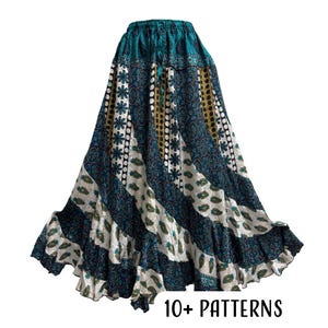 May include: A long, flowing skirt with a teal waistband and a variety of patterned panels. The skirt features stripes of white, teal, and gold fabric with floral and paisley designs. The text "10+ PATTERNS" is at the bottom.