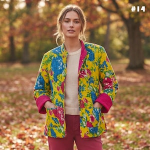 May include: A quilted jacket featuring a vibrant yellow base with a floral pattern in shades of blue, pink, and green. The jacket has long sleeves with solid pink cuffs, a round neckline, and two front patch pockets. The text #14 appears at the top.