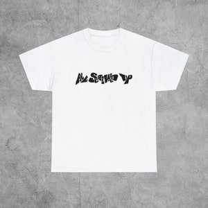 May include: White t-shirt with a black graphic that says "All Screwed Up" in a stylized font.