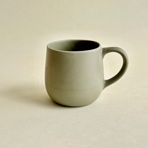 Handmade light porcelain kitchen essential mugs.