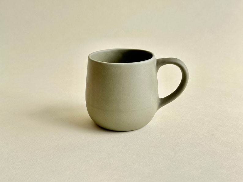 Handmade light porcelain kitchen essential mugs.