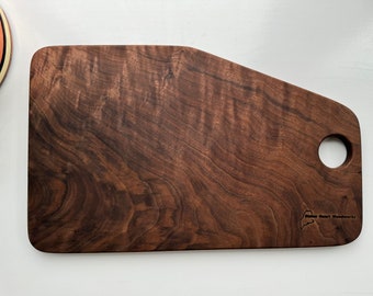 Small reversible highly figured walnut charcuterie/presentation/serving board.