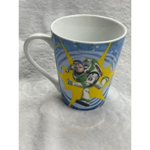 Disney Pixar Toy Story Buzz Lightjahre/Woody Keramik Kaffeebecher konische Tasse Bild 3