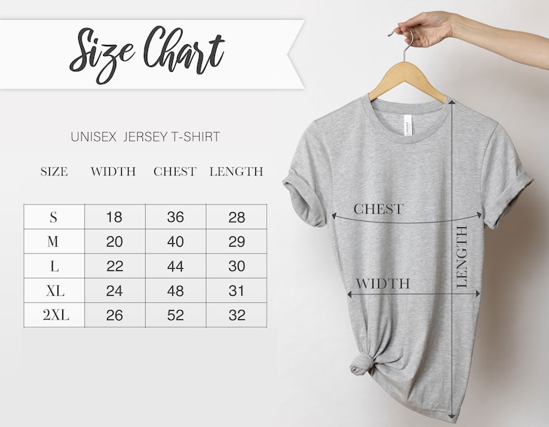 May include: A light gray unisex jersey t-shirt hanging on a wooden hanger. The image includes a size chart with measurements in inches for width, chest, and length. The chart lists sizes S, M, L, XL, and 2XL.