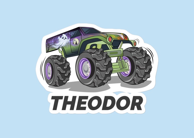 May include: A green monster truck with a ghost and lightning bolt design. The truck has large black tires with purple rims and the words "THEODOR" are printed on the bottom of the sticker.