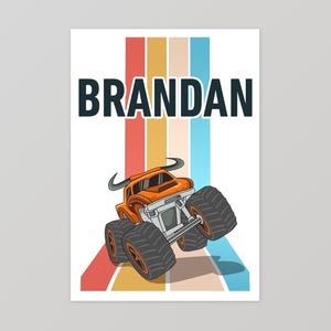May include: A colorful retro-style poster with the name "BRANDAN" in black text. The poster features a cartoon monster truck with orange body and black wheels, driving on a striped background.