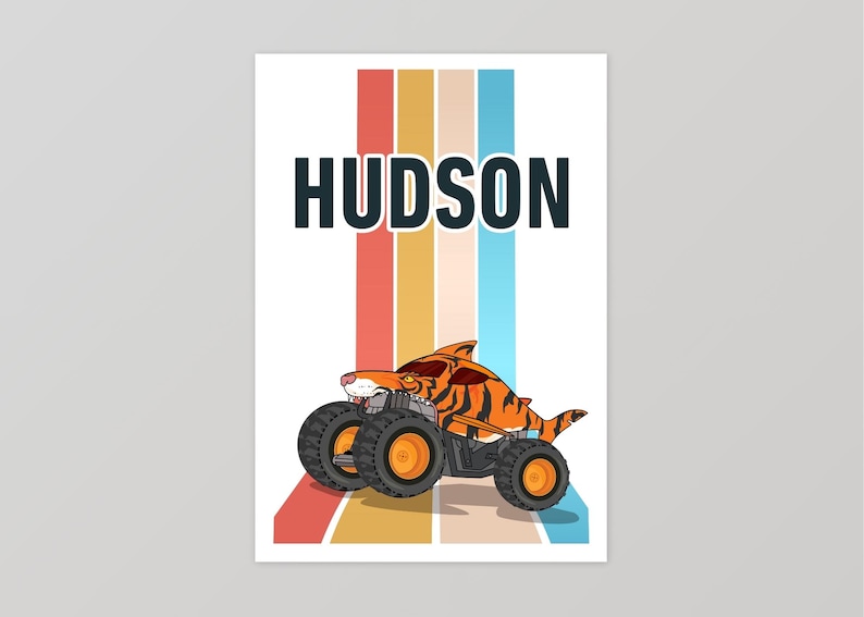 May include: A colorful retro-style poster with a monster truck design. The truck is orange and black with a tiger stripe pattern. The truck is driving on a rainbow-colored background. The name "HUDSON" is printed in black at the top of the poster.