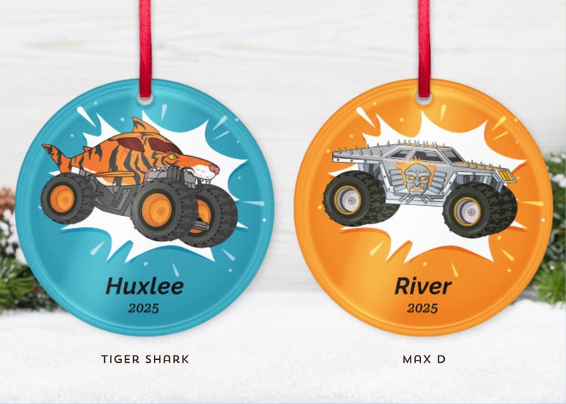 May include: Two round Christmas ornaments with red ribbons. One features a tiger shark monster truck on a blue background, the other a silver monster truck on an orange background. The names "Huxlee" and "River" are printed on the ornaments.