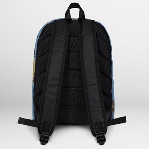 May include: A blue and brown patterned backpack with black adjustable straps and a mesh back panel.