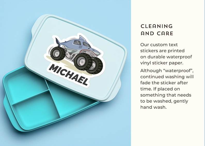 May include: A light blue lunchbox with a removable lid. The lid has a sticker of a blue monster truck with the name "MICHAEL" printed on it. The lunchbox has four compartments.