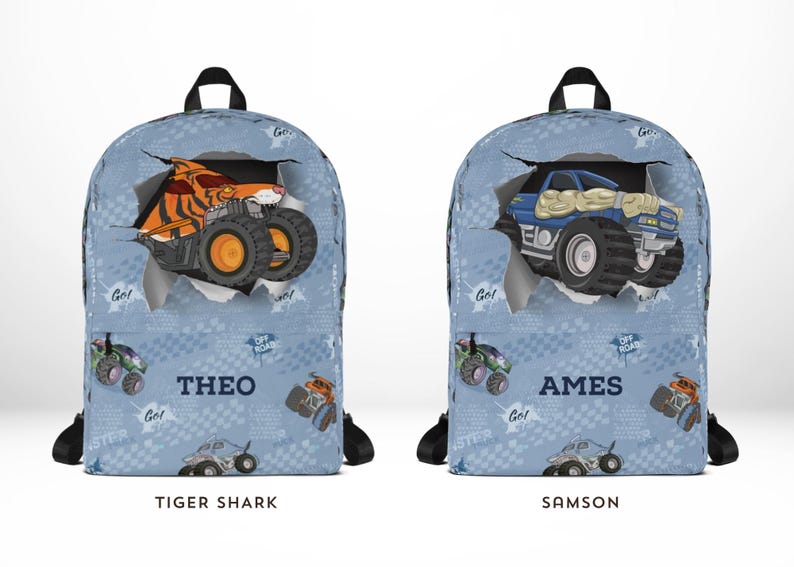 May include: Two blue backpacks with monster truck designs. One features an orange tiger shark truck, the other a blue truck. Each has a name printed on it. The background has a repeating pattern of monster trucks and the words "Go" and "Off Road".