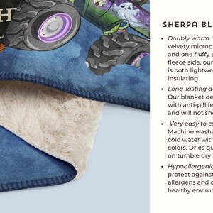 May include: Sherpa blanket featuring a monster truck design with a blue background and a soft, cream-colored interior. The blanket has a velvety microplush side and a fluffy sherpa fleece side.