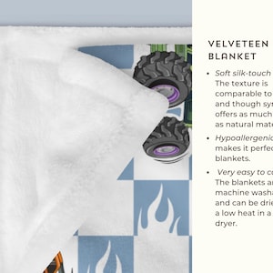 May include: A white, blue and green checkered pattern blanket with a monster truck design. The blanket is made of soft, velvety minky fabric. The text "VELVETEEN MINKY BLANKET" is visible in the image.