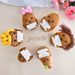May include: A selection of handmade crochet potato figures, each with a unique design. Some potatoes have accessories like a pink bow or hair. Each potato holds a small card with text. The word "potato" is written in the centre.