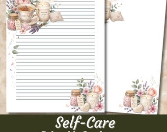 May include: Two sheets of stationery, one lined and one unlined, featuring watercolor illustrations of tea cups, candles, lavender, and pink flowers. A small note reads Be gentle with yourself. The designs include jars and heart-shaped accents.