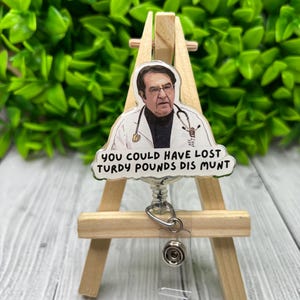 Thirty Pounds Badge Reel
