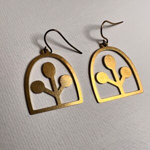 Brass drop long flat domed half ellipse cutout leaf charm boho earrings