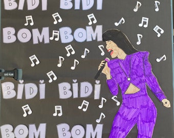 May include: A poster with the words "Nuestros Corazones" and "Bidi Bidi Bom Bom" in purple and white. A drawing of a singer in a purple outfit is holding a microphone. Musical notes are scattered around the poster.