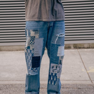 Upcycled Patchwork Peace Sign Denim Jeans image 1