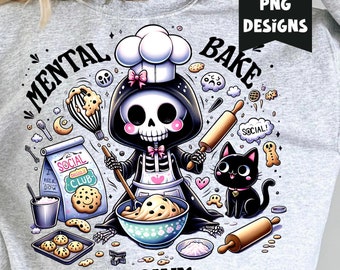May include: A grey sweatshirt featuring a graphic design of a skeleton wearing a chef's hat and baking cookies. The text "Mental Bake Down" is printed on the sweatshirt.
