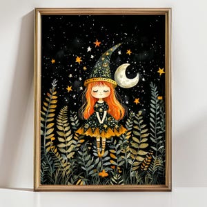 May include: A framed art print featuring a whimsical illustration of a young witch with orange hair, wearing a black dress and hat adorned with stars. The background is a starry night sky with a crescent moon, and the foreground has stylized plants.