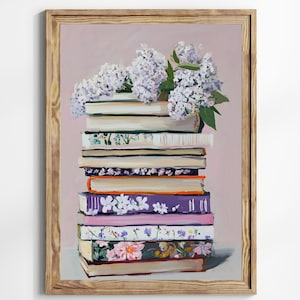 May include: A stack of books with floral patterned covers, topped with a bouquet of purple lilac flowers against a light purple background.