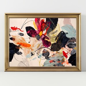 May include: Abstract art print in a gold frame. The artwork features a vibrant mix of colors, including red, black, yellow, and blue, with orange fish and floral-like shapes. The painting has a modern, artistic style.