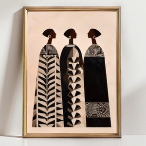 May include: Framed art print featuring three figures in profile, each wearing a long, patterned garment. The figures are depicted in black and white with geometric designs. The artwork is framed in a gold-colored frame.