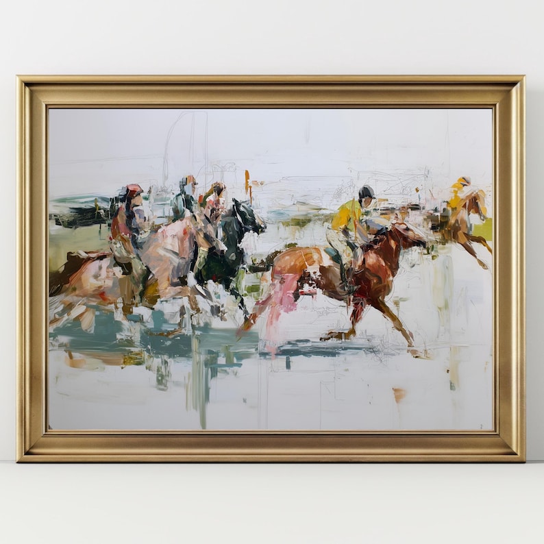 May include: An abstract painting of a horse race in a gold frame. The artwork depicts several horses and jockeys in motion, with a palette of browns, greens, and pinks. The painting has a textured, brushstroke style, and is set against a white background.
