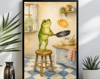 Può includere: Una stampa artistica da parete incorniciata che raffigura una rana verde in piedi su uno sgabello di legno in una cucina, che tiene in mano una padella nera mentre un pancake dorato fluttua nell'aria. La scena include un pavimento a scacchi.