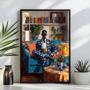 May include: A framed art print depicting a person wearing a blue patterned suit and round sunglasses, sitting on a bright blue sofa. The scene includes a bookshelf, potted plants, an orange pillow, and a vase of flowers on a round table.