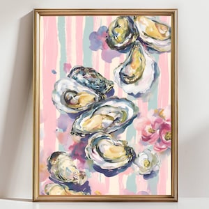 May include: A framed art print featuring a watercolor painting of oysters and flowers. The artwork has a pink and blue striped background. The oysters are open, with yellow and white details. Pink and white flowers are also present.