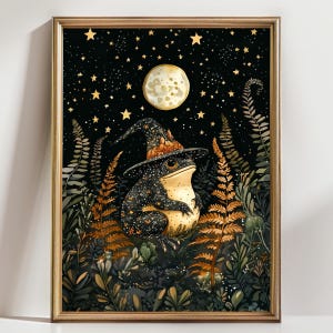 May include: A black frog wearing a witch's hat with gold stars sits in a forest with ferns and a full moon in the background.