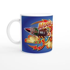 May include: A set of three ceramic mugs with a speckled, matte finish in cream, light grey, and dark grey. Each mug has a simple, minimalist design, suitable for coffee or tea.