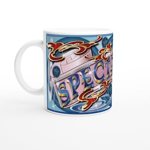 May include: White ceramic mug with a blue and pink design. The mug features the word "SPECIAL" in a stylized font, with decorative red and gold accents. The design includes a pink shape and blue star details.