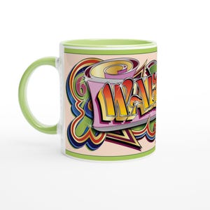 May include: A white ceramic mug with a black handle and the text "But First, Coffee" in a black, handwritten-style font. The mug is on a white surface.