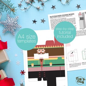 May include: A printable Nutcracker cookie box template with step-by-step instructions. The design features a colorful Nutcracker soldier with a mustache, green jacket, and black pants. The template is A4 size.