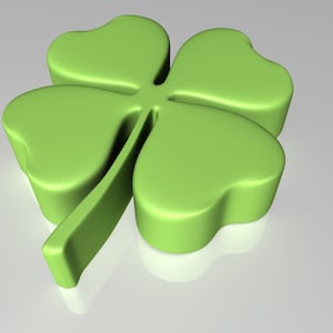 May include: A three-dimensional green four-leaf clover with a shiny, glossy finish.