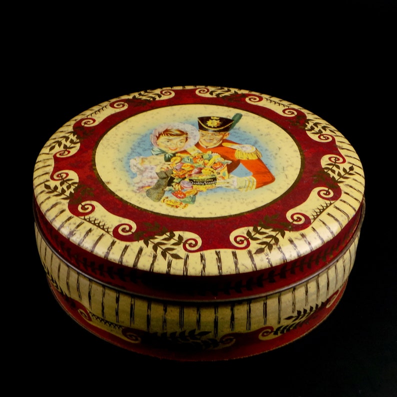 Antyczne okrągłe blaszane pudełko Mackintosh's Quality Street Antyczna puszka kolekcjonerska Złoto-czerwone Toffi i czekoladki Mackintosh's zdjęcie 1