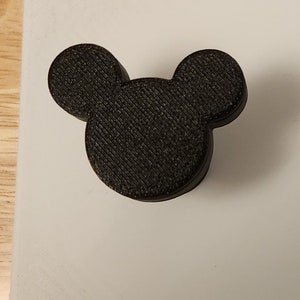 May include: Black 3D printed Mickey Mouse head.