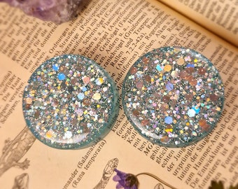 a pair of ear buttons | Icy | Plugs tunnels