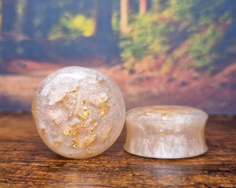 a pair of ear studs | Champagne | Plugs Tunnel