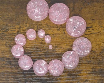 a pair of ear studs | Sakura | Plugs Tunnel