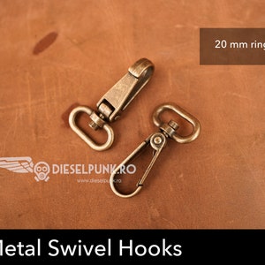 May include: Two gold-toned metal swivel hooks with a 20 mm ring.  Solid Metal Swivel Hooks.