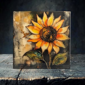 May include: A close-up of a painting of a sunflower with yellow petals and a dark brown center. The sunflower is painted on a textured background with shades of brown, gold, and green.