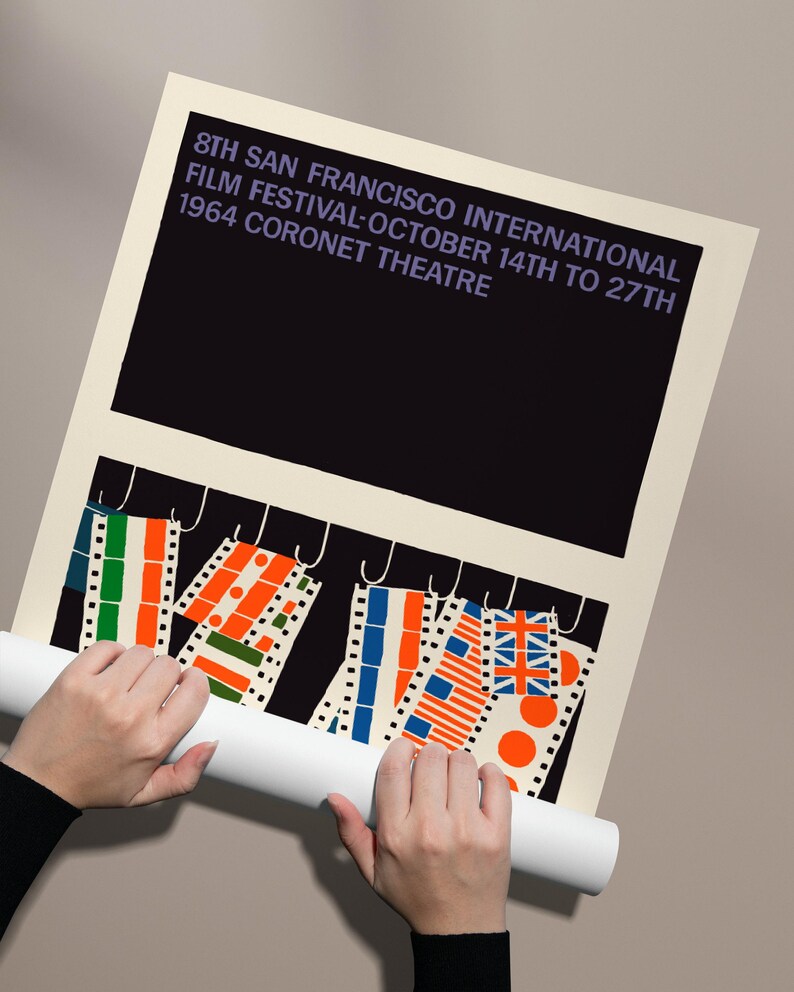 A poster for the 8th San Francisco International Film Festival, featuring a large black background with text and a colorful abstract design below.