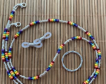 Bead chain to hold eyeglasses and masks.  Small rainbow colored and white glass beads.