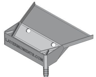May include: A gray plastic 3D printed funnel with a spout and two holes on the side. The funnel has the text "LAYERMOMENTS.COM" printed on the side.