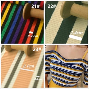 May include: Close-up of three different striped fabrics with measurements in inches. The first fabric is a multi-colored striped fabric with a 0.55 inch stripe width. The second fabric is a white and green striped fabric with a 1.4 inch stripe width. The third fabric is a peach and gray striped fabric with a 2.1 inch stripe width and a 0.6 inch stripe width.